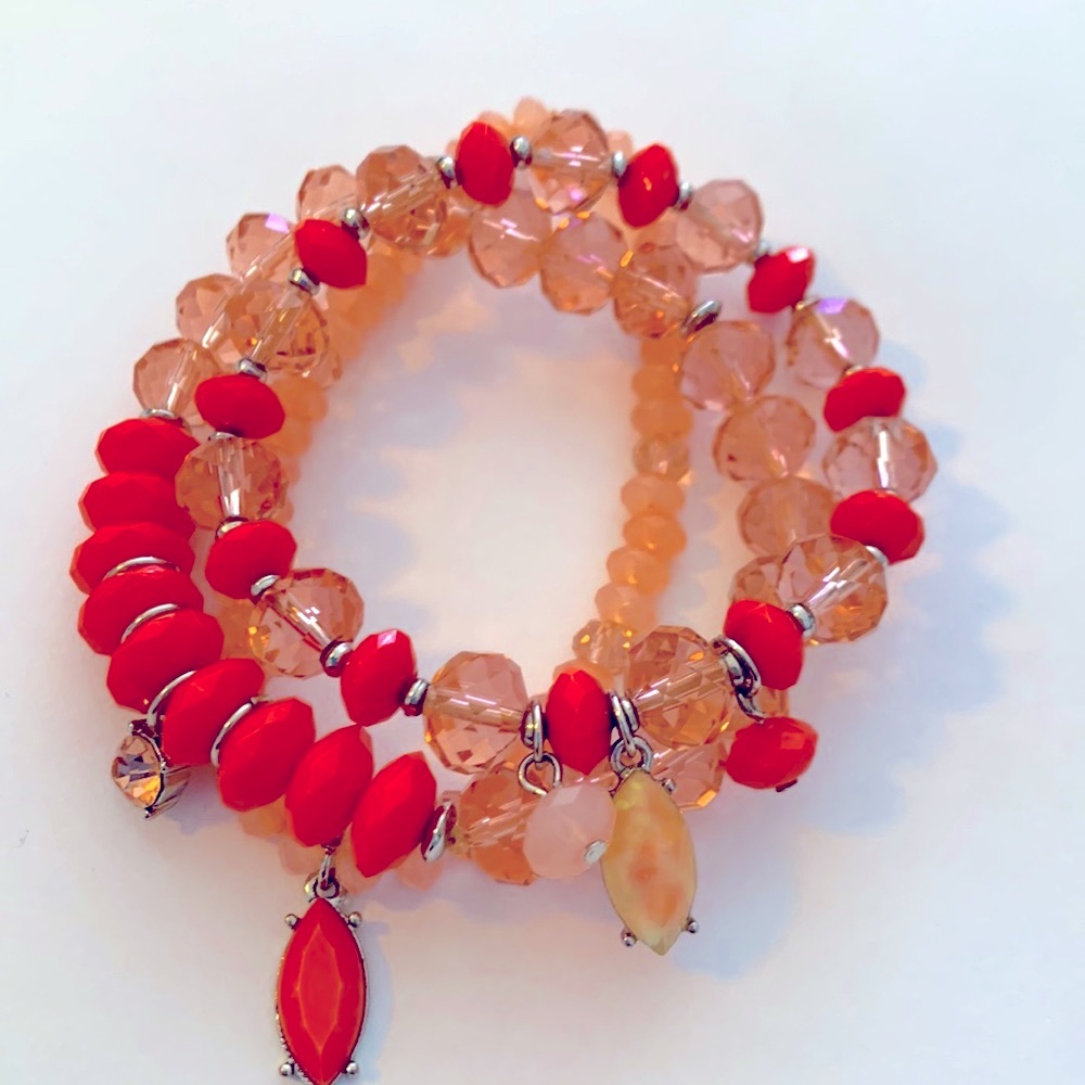 3/$20 Three piece orange peach bracelet set